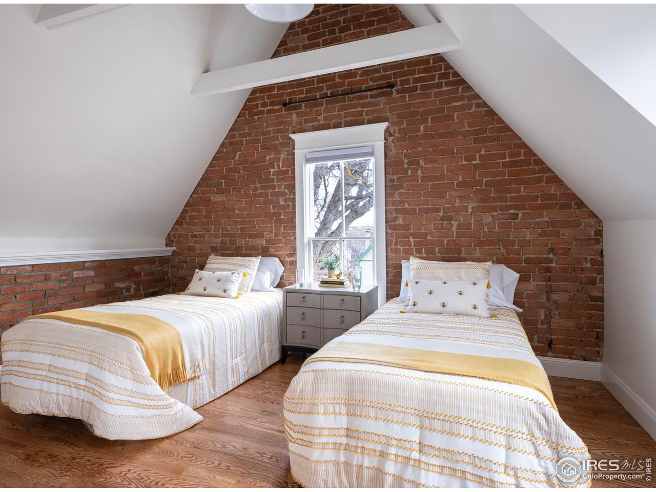 2303 Bluff Street Boulder, CO 80304 - Photo 28 of 40 a bedroom with two beds and painted walls