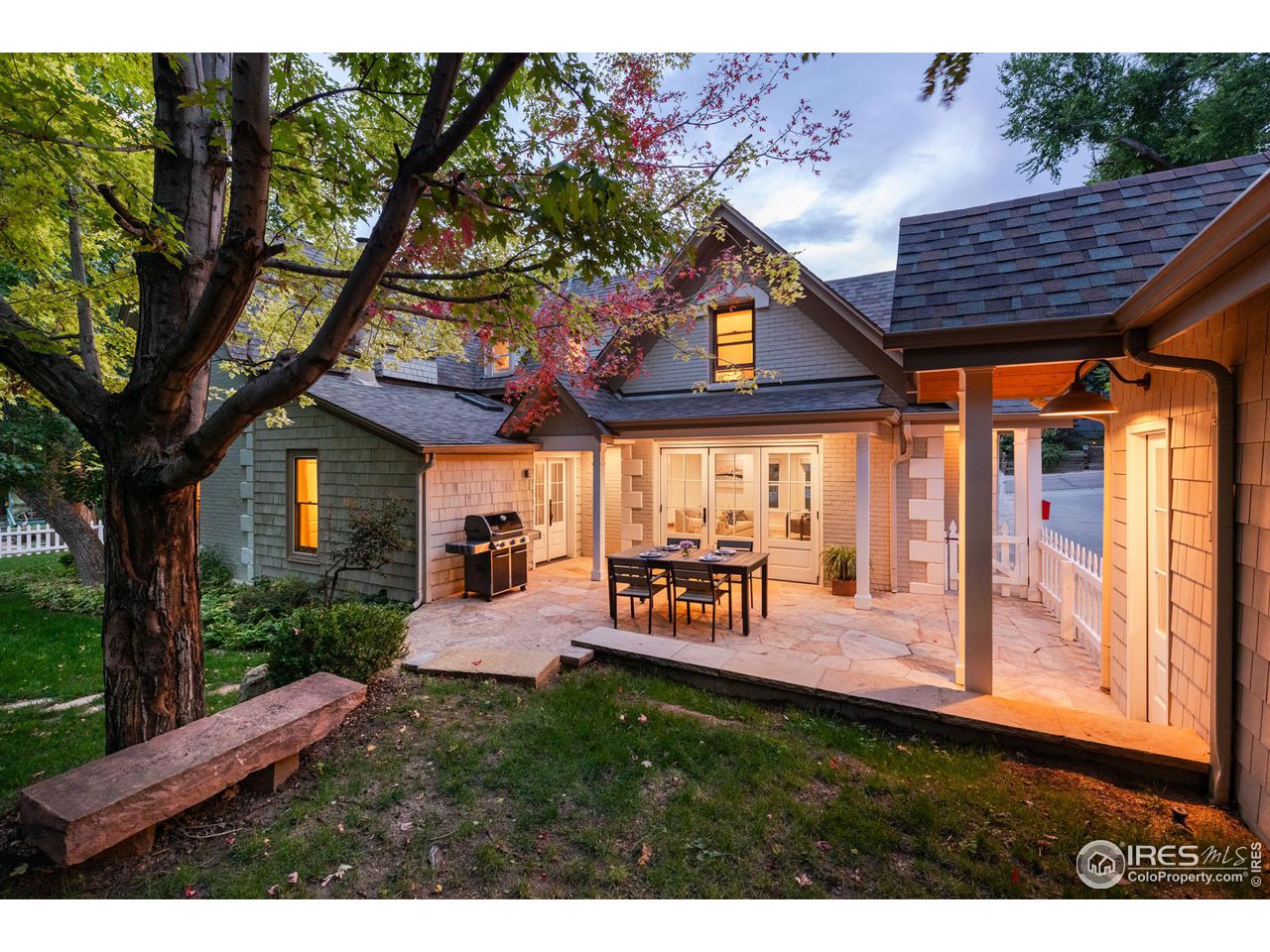 2303 Bluff Street Boulder, CO 80304 - Photo 34 of 40 a view of a chairs and table in backyard of the house
