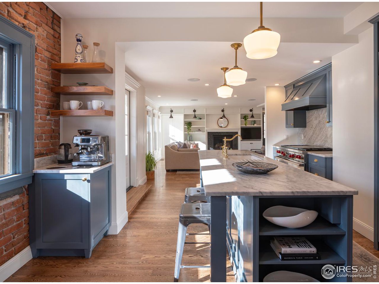 2303 Bluff Street Boulder, CO 80304 - Photo 10 of 40 a kitchen with a table chairs stove and cabinets