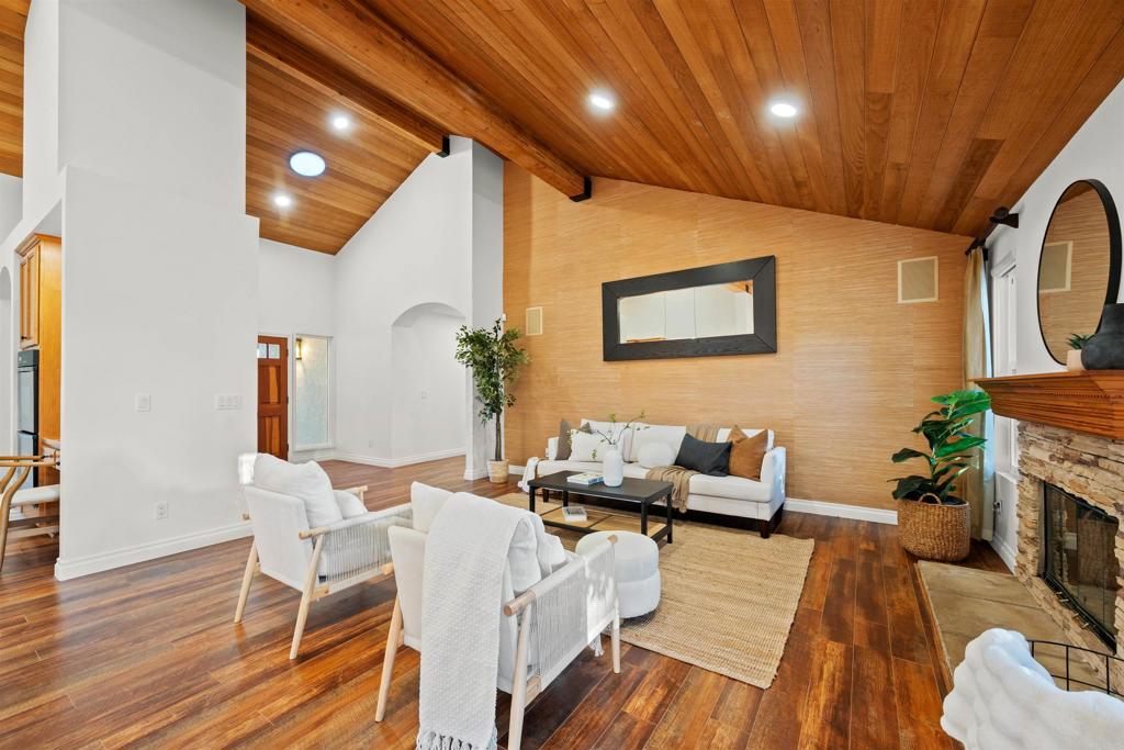 1062 Monterey Vista Way Encinitas, CA 92024 - Photo 15 of 70 a living room with furniture and a fireplace