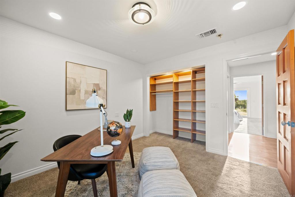 1062 Monterey Vista Way Encinitas, CA 92024 - Photo 38 of 70 a living room with furniture and a window