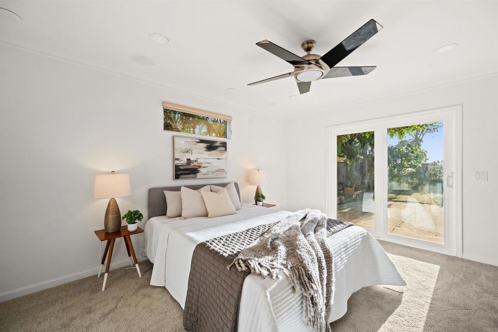1062 Monterey Vista Way Encinitas, CA 92024 - Photo 45 of 70 a bedroom with a bed and window