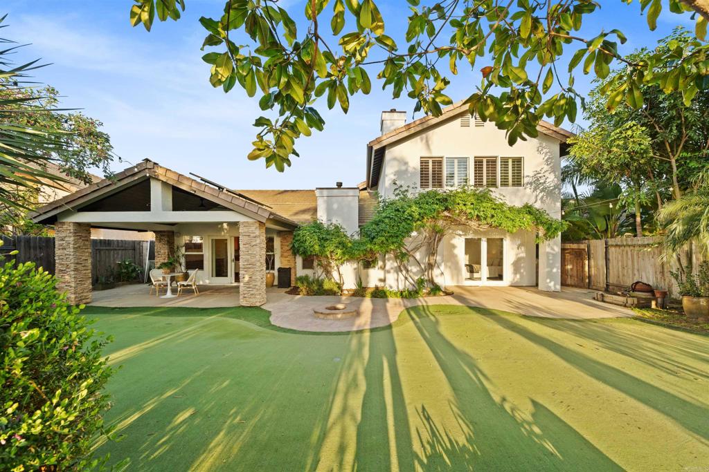 1062 Monterey Vista Way Encinitas, CA 92024 - Photo 66 of 70 a front view of a house with a yard