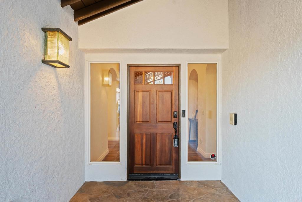 1062 Monterey Vista Way Encinitas, CA 92024 - Photo 10 of 70 a view of front door with wooden floor
