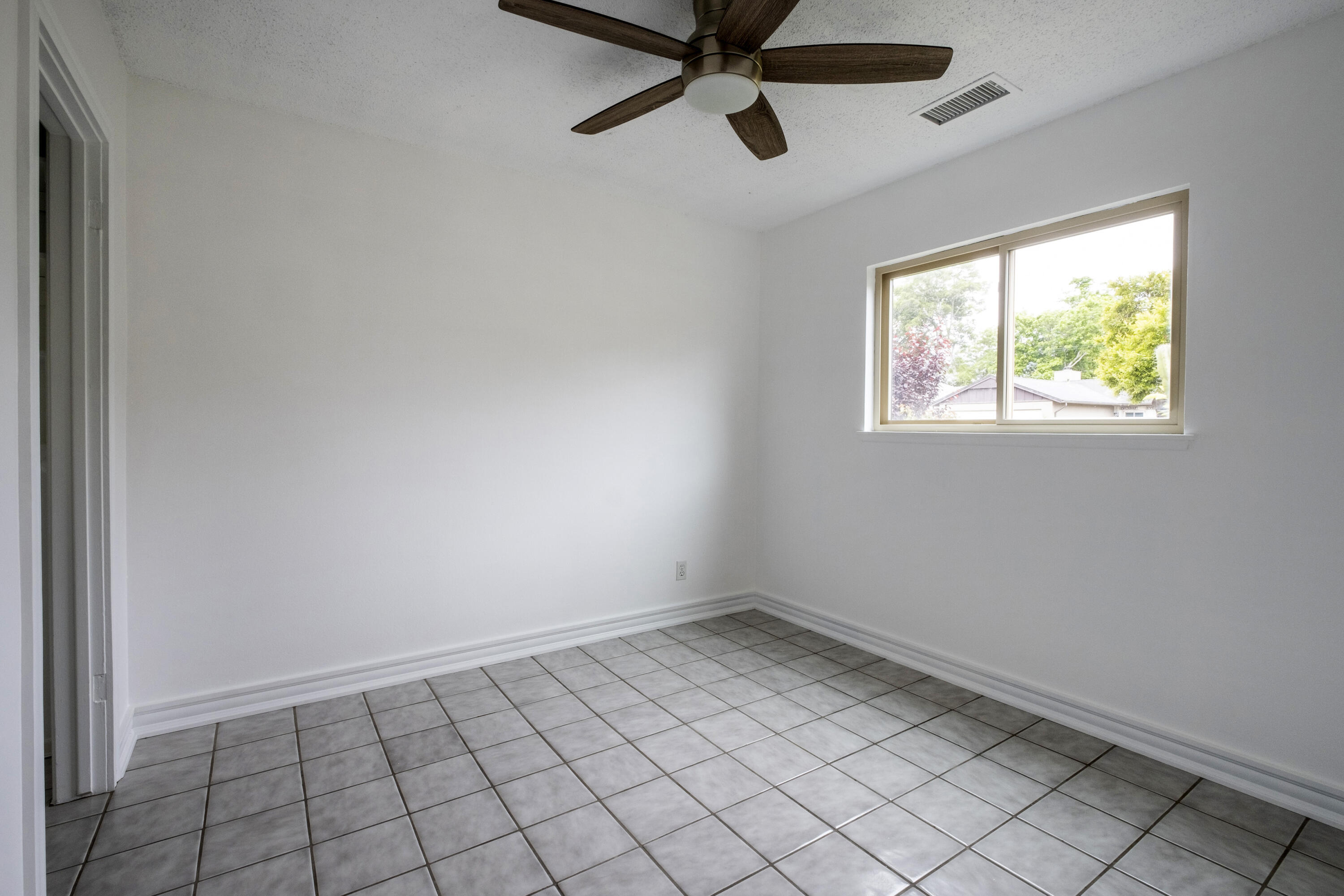2530 Murrell Road Santa Barbara, CA 93109 - Photo 11 of 19 a view of an empty room and window