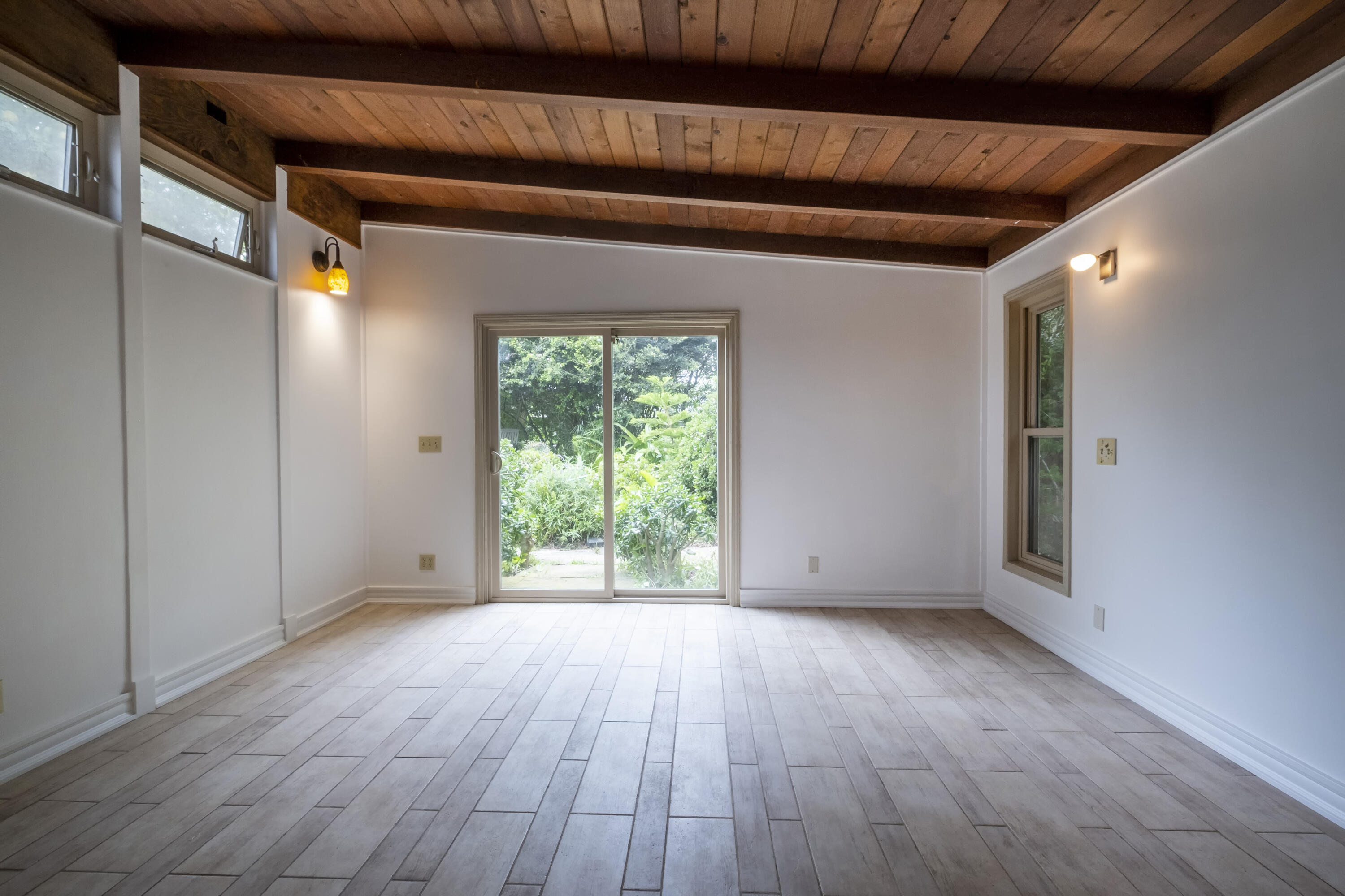 2530 Murrell Road Santa Barbara, CA 93109 - Photo 7 of 19 a view of room with window and wooden floor