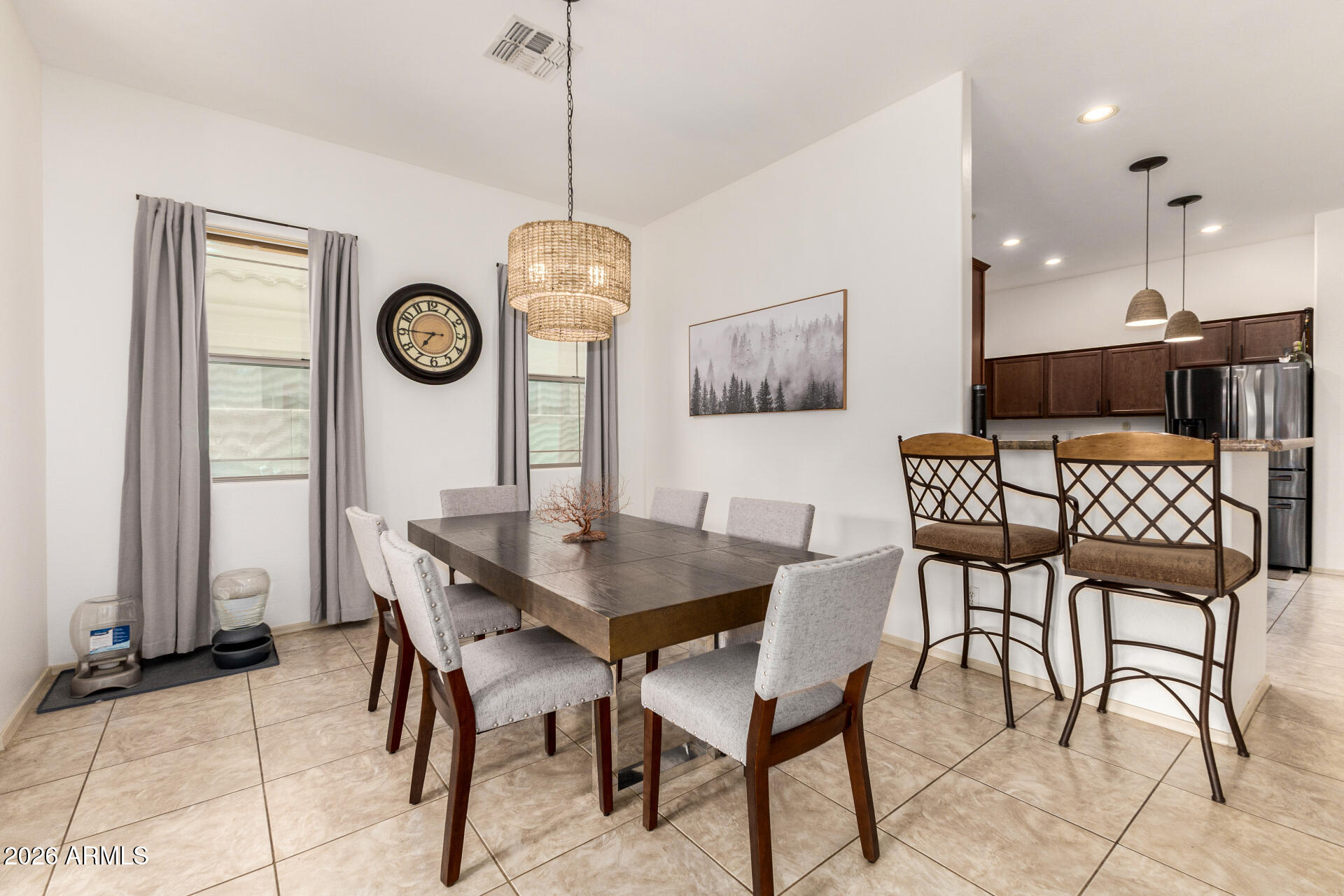 6202 East McKellips Road, Unit 189 Mesa, AZ 85215 - Photo 12 of 33 a view of a dining room and livingroom