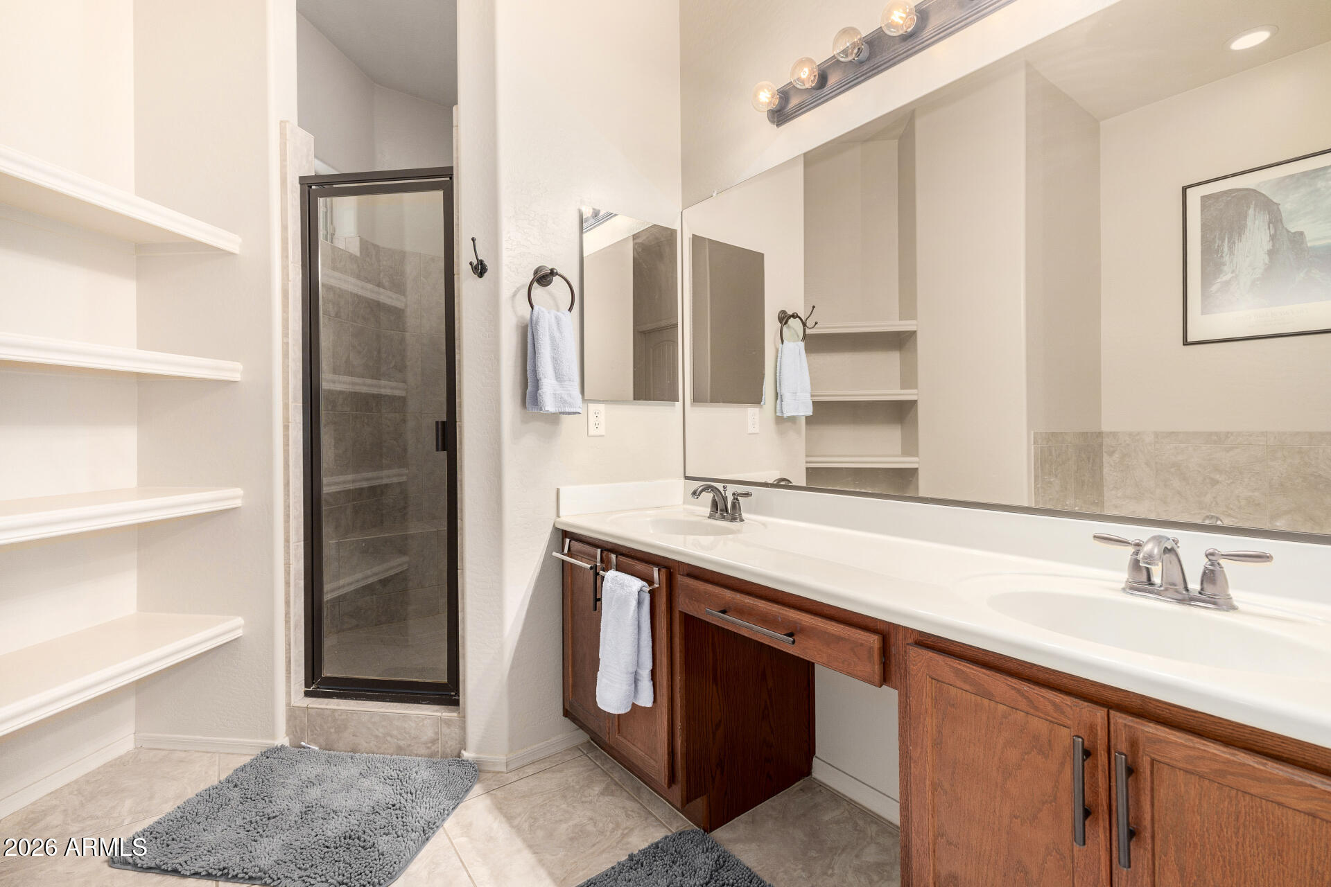 6202 East McKellips Road, Unit 189 Mesa, AZ 85215 - Photo 22 of 33 a spacious bathroom with a granite countertop sink and a mirror