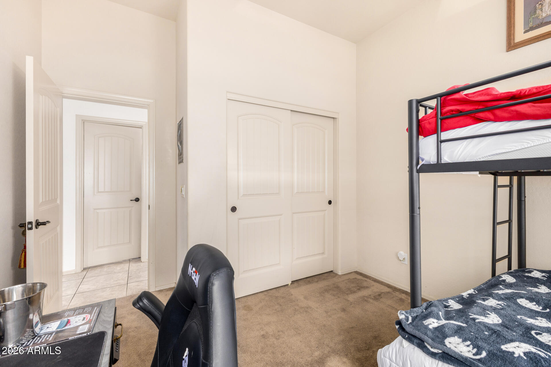 6202 East McKellips Road, Unit 189 Mesa, AZ 85215 - Photo 24 of 33 a view of a livingroom with a window and chair