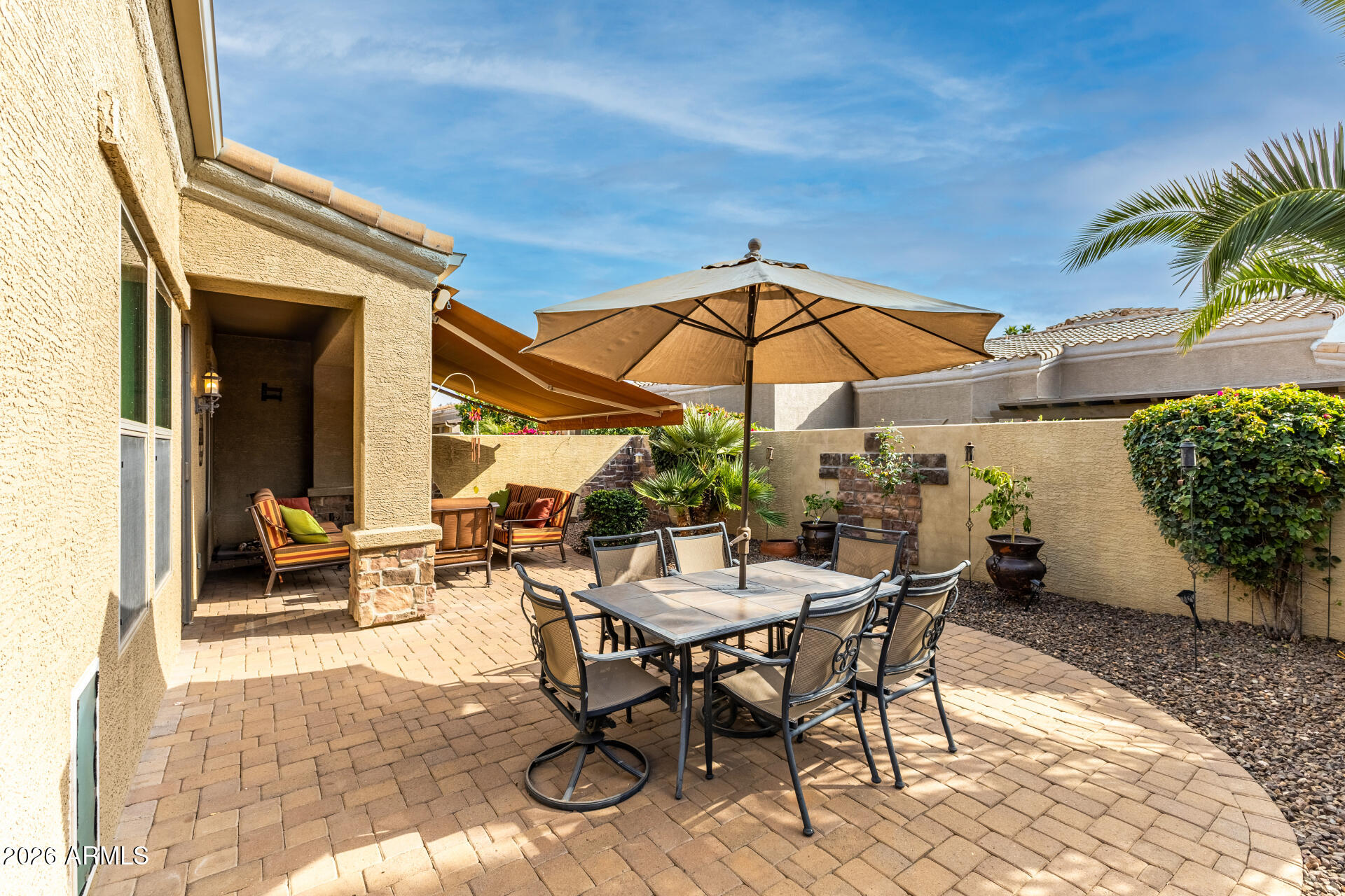 6202 East McKellips Road, Unit 189 Mesa, AZ 85215 - Photo 33 of 33 a view of a backyard with sitting area