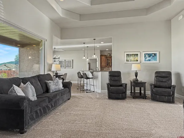 a living room with furniture and a couch