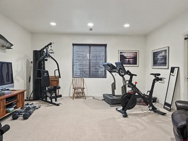 a view of a room with gym equipment