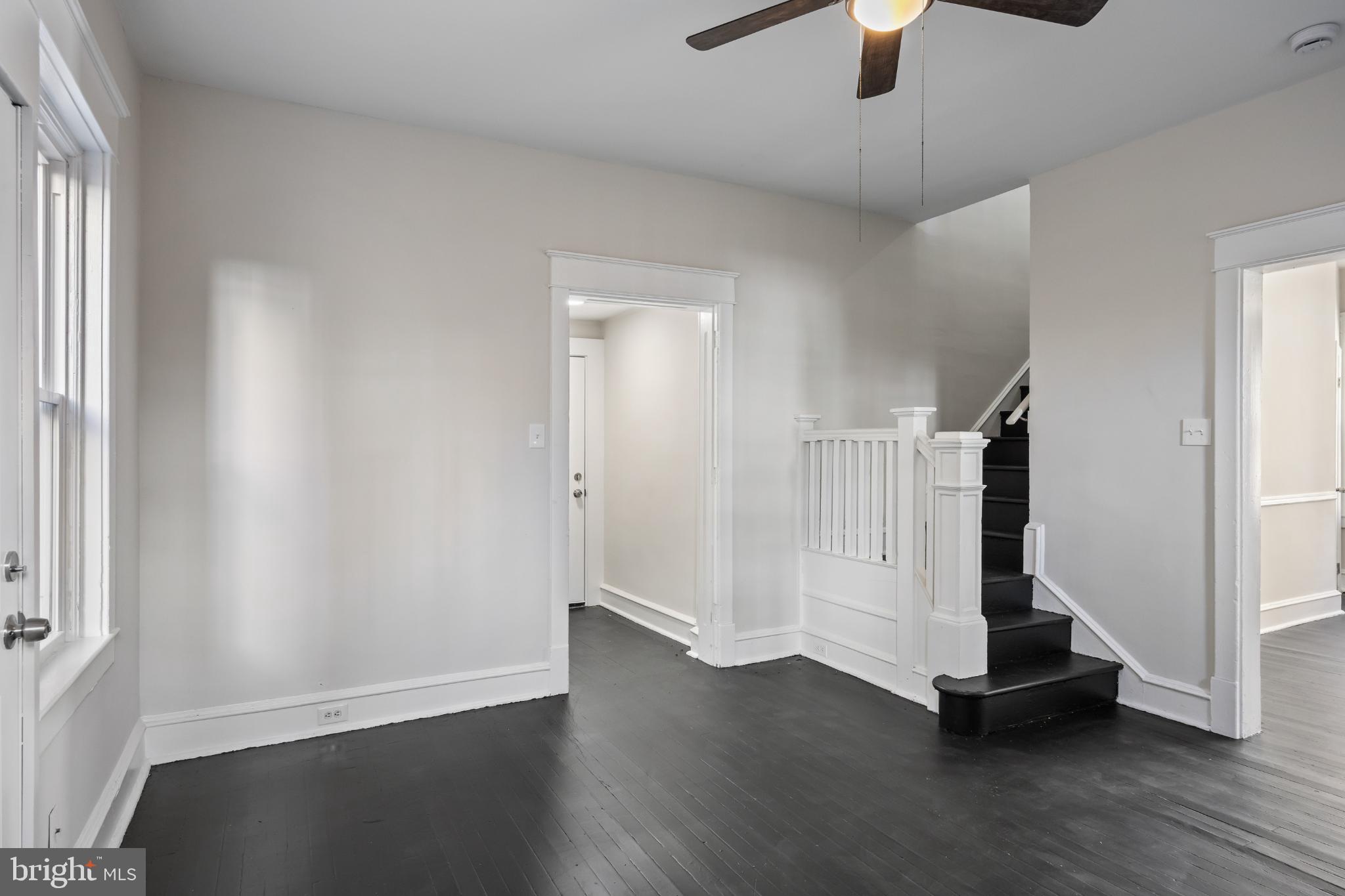 2003 Edgmont Avenue Chester, PA 19013 - Photo 18 of 40 wooden floor in an empty room with a window