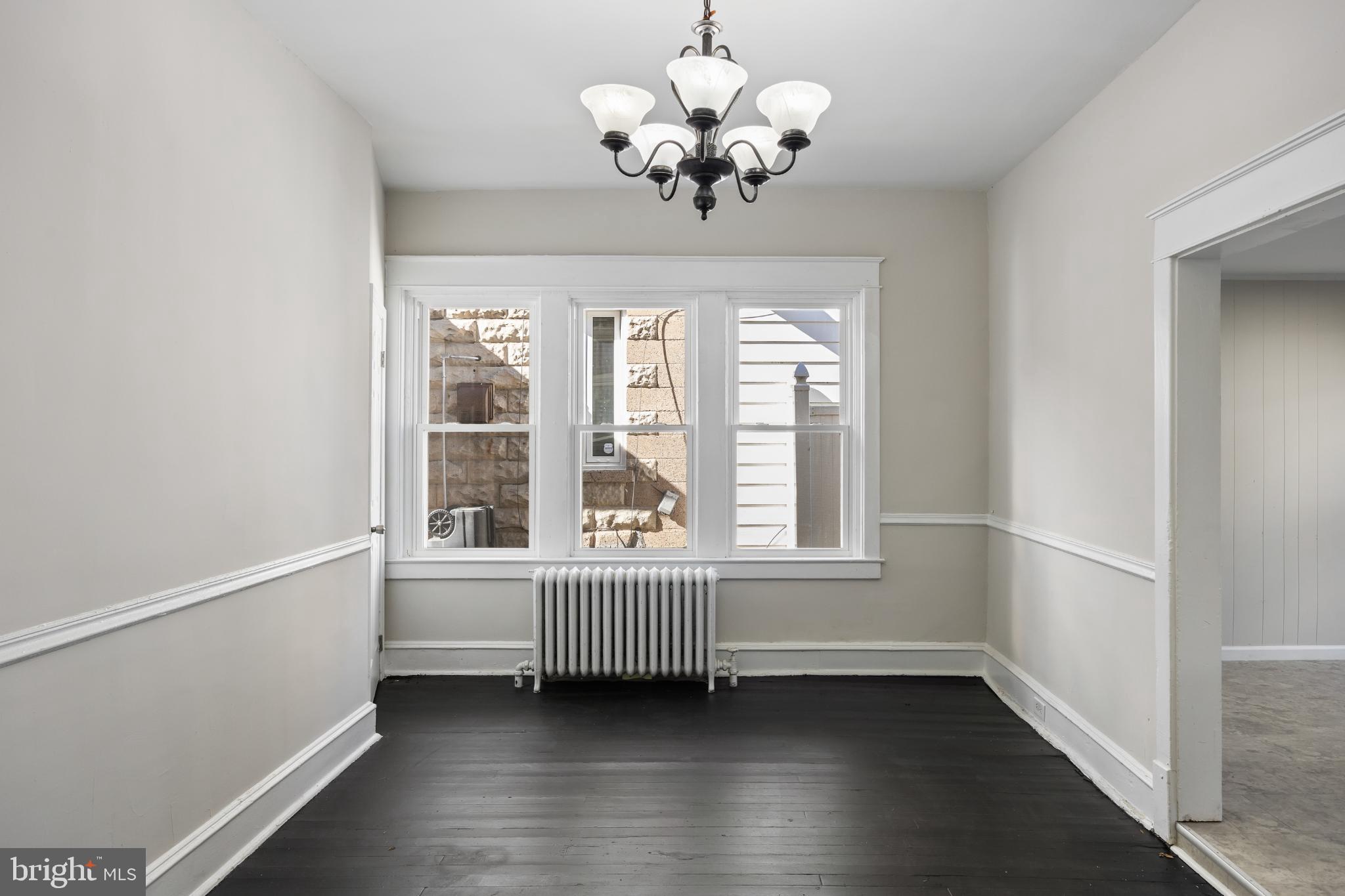2003 Edgmont Avenue Chester, PA 19013 - Photo 20 of 40 a view of an empty room with a window