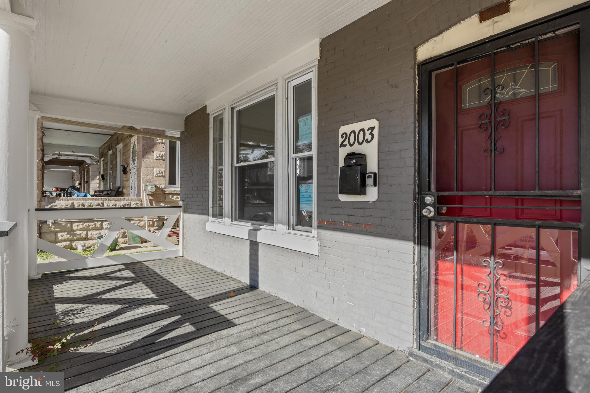 2003 Edgmont Avenue Chester, PA 19013 - Photo 3 of 40 a living room with furniture