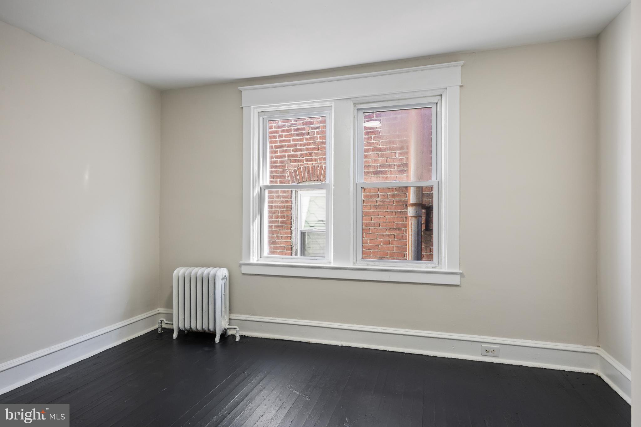 2003 Edgmont Avenue Chester, PA 19013 - Photo 33 of 40 an empty room with a window