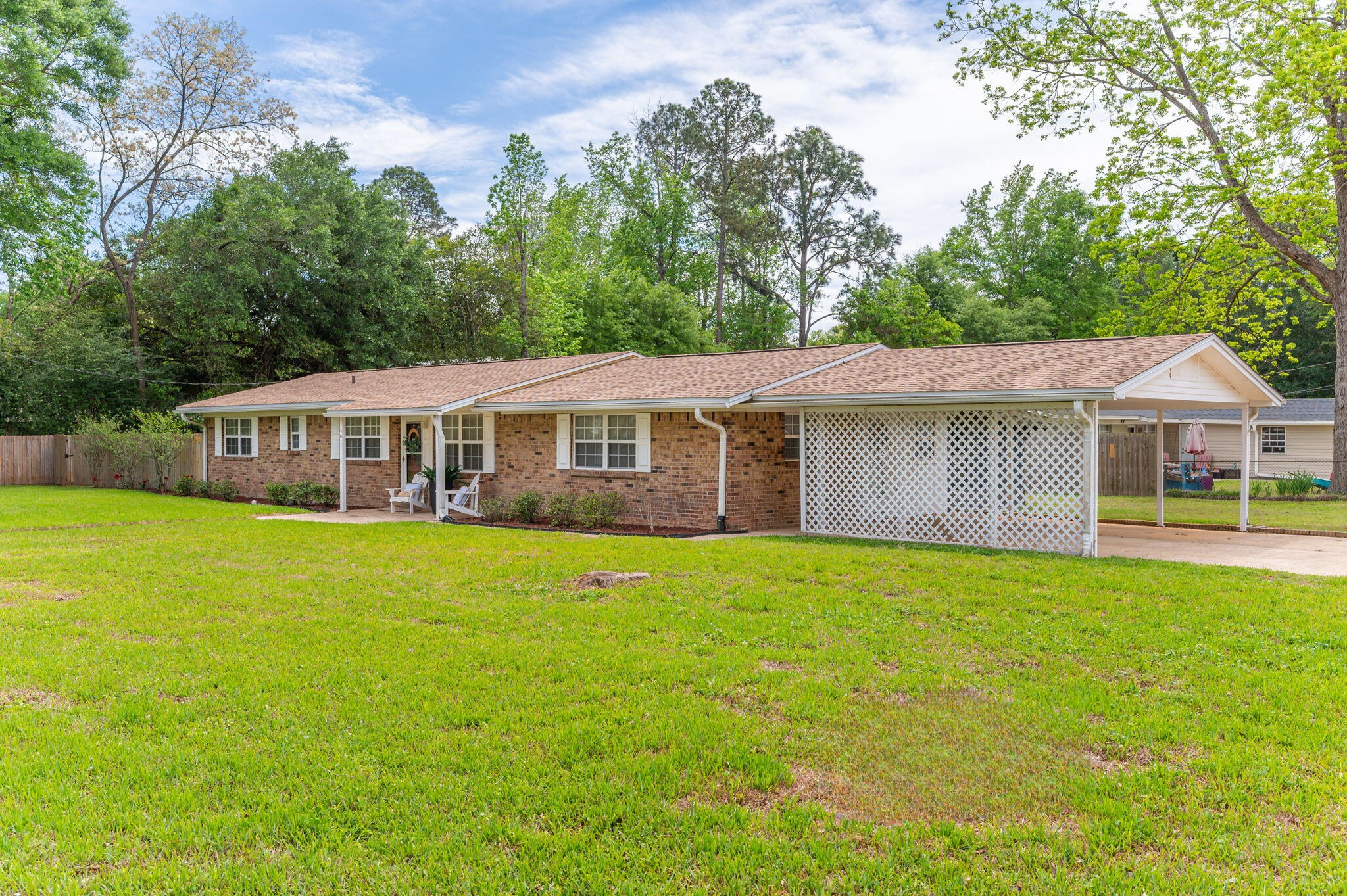 501 Jones Road Crestview, FL 32536 - Photo 2 of 32 a front view of a house with a garden