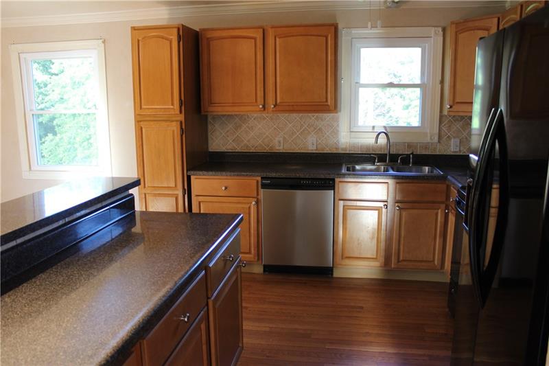 346 Reese Road Washington, PA 15301 - Photo 12 of 25 Two tiered countertop for barstool seating