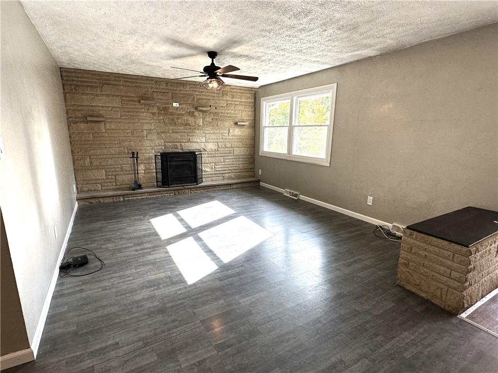 916 Atlasburg Road Burgettstown, PA 15021 - Photo 12 of 28 an empty room with windows and fireplace