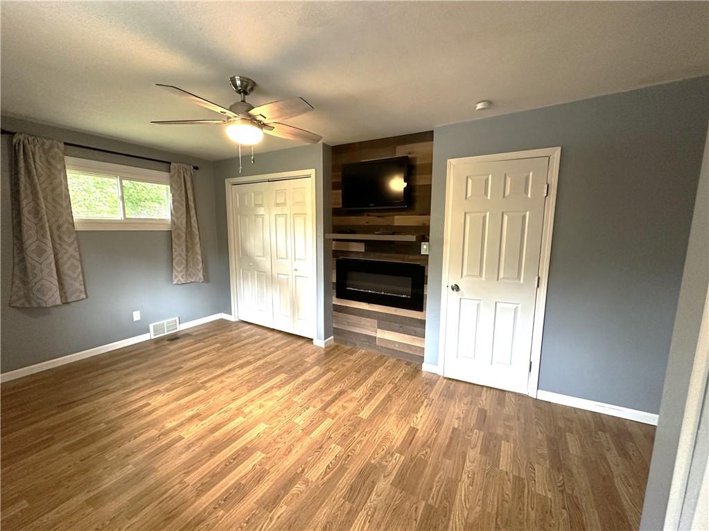 916 Atlasburg Road Burgettstown, PA 15021 - Photo 15 of 28 a view of empty room with wooden floor and fan