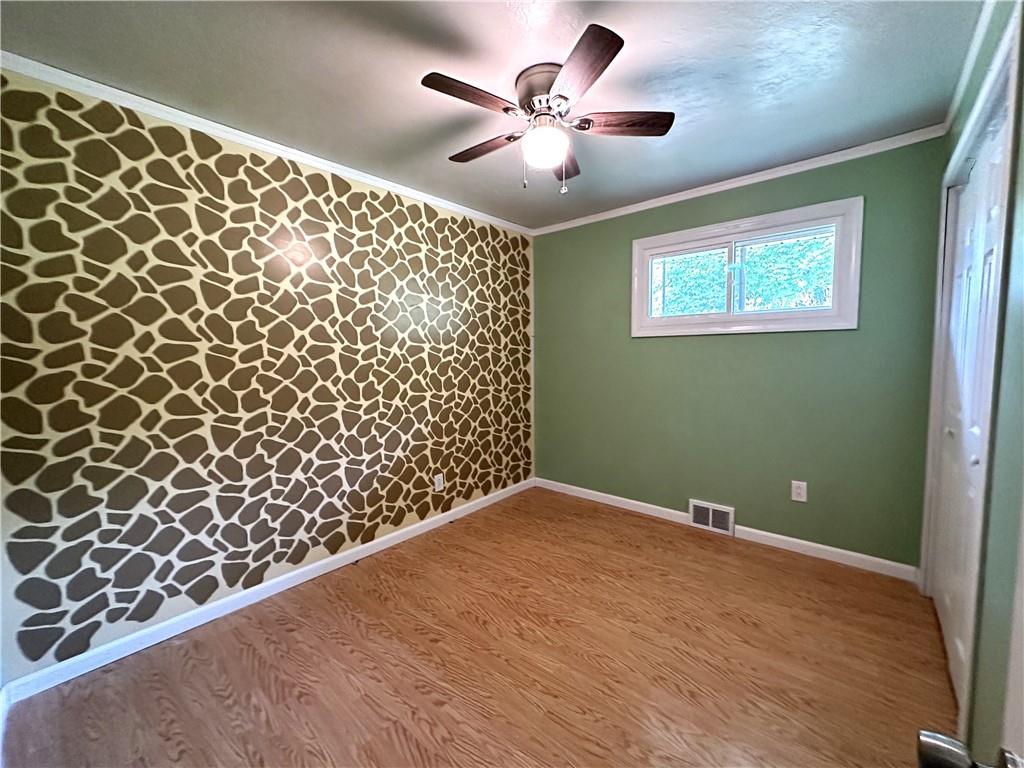 916 Atlasburg Road Burgettstown, PA 15021 - Photo 17 of 28 a view of a big room with wooden floor