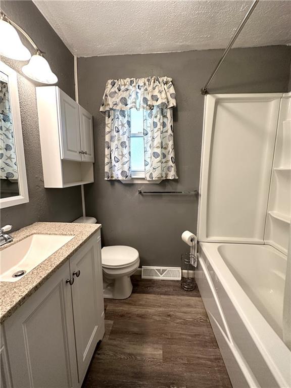 916 Atlasburg Road Burgettstown, PA 15021 - Photo 21 of 28 a bathroom with a granite countertop sink toilet and shower