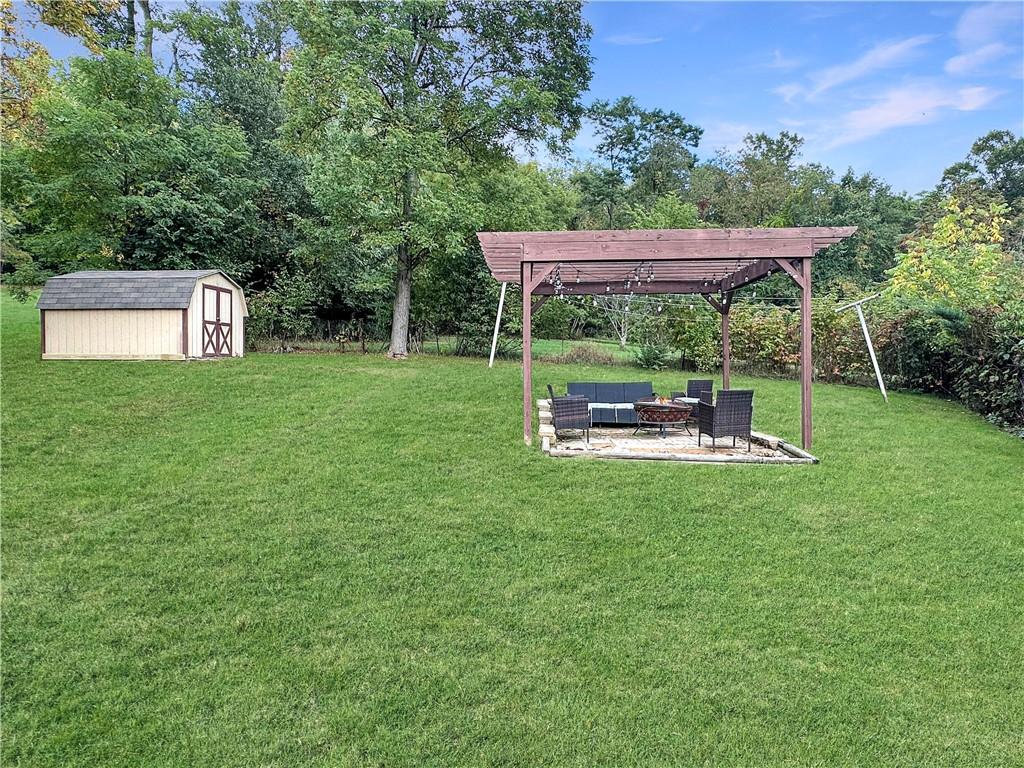 916 Atlasburg Road Burgettstown, PA 15021 - Photo 6 of 28 a view of a table and chairs in the garden