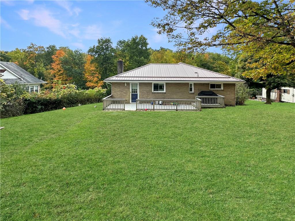 916 Atlasburg Road Burgettstown, PA 15021 - Photo 8 of 28 a front view of a house with garden