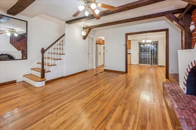 a view of entryway with wooden floor
