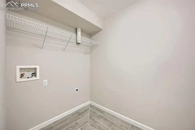 a view of a room with racks on the wall