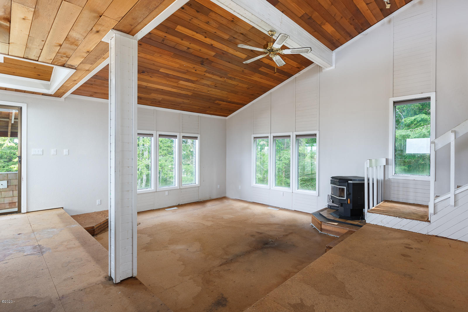 7705 Simmons Road Pacific City, OR 97135 - Photo 4 of 29 Living Room with pellet stove