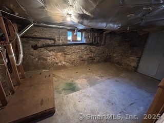 10 Hill Street, Unit 1 New Canaan, CT 06840 - Photo 9 of 10 a view of a garage