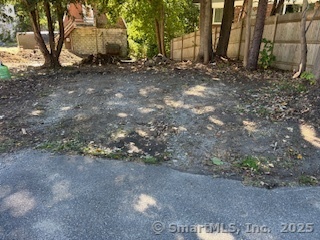 10 Hill Street, Unit 1 New Canaan, CT 06840 - Photo 10 of 10 a backyard of a house with lots of green space