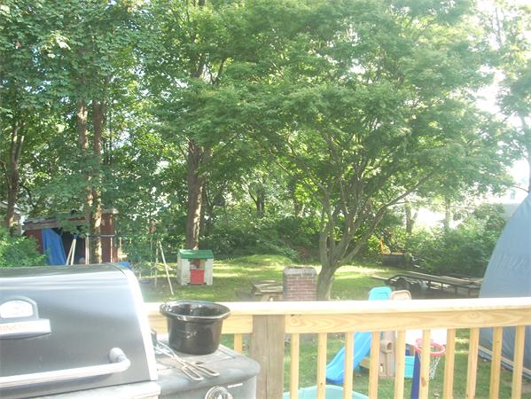 167 Pebble Street Fall River, MA 02721 - Photo 3 of 18 a view of a water fountain and a patio