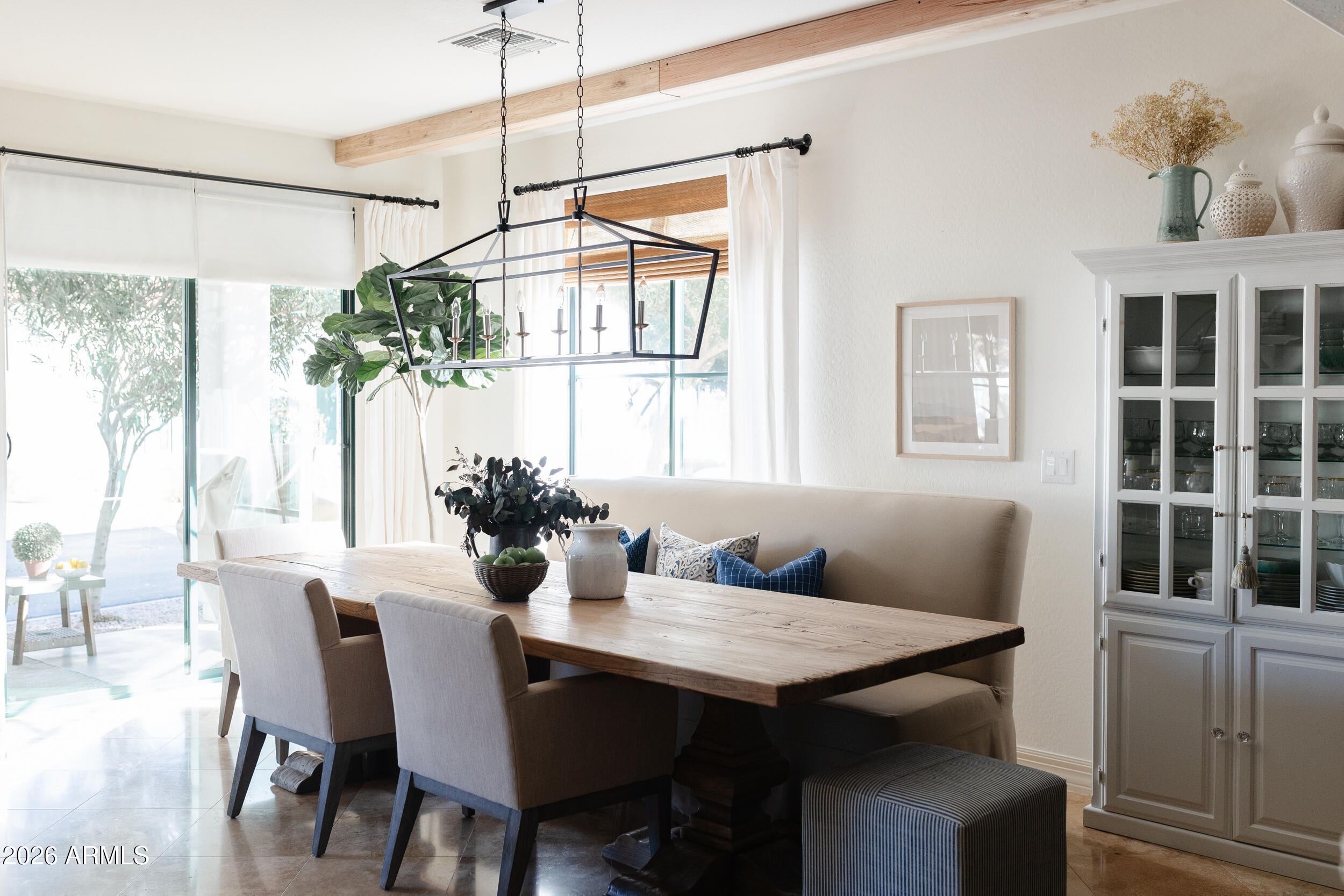 1777 West Ocotillo Road, Unit 29 Chandler, AZ 85248 - Photo 11 of 78 a view of a dining room with furniture window and outside view