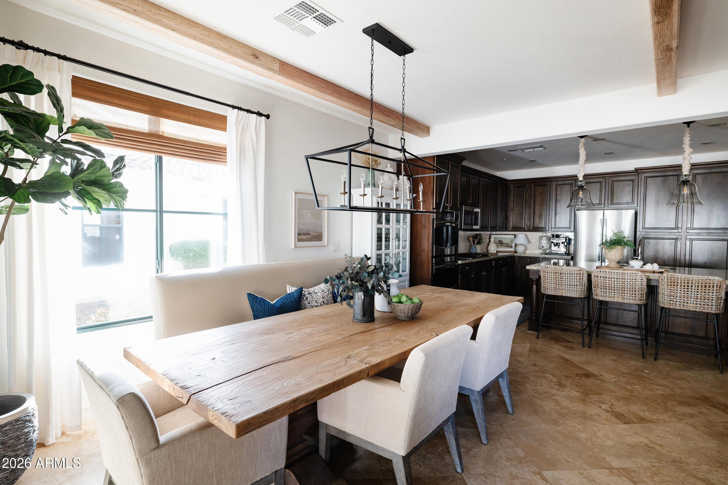 1777 West Ocotillo Road, Unit 29 Chandler, AZ 85248 - Photo 12 of 78 a view of a dining room with furniture window and wooden floor