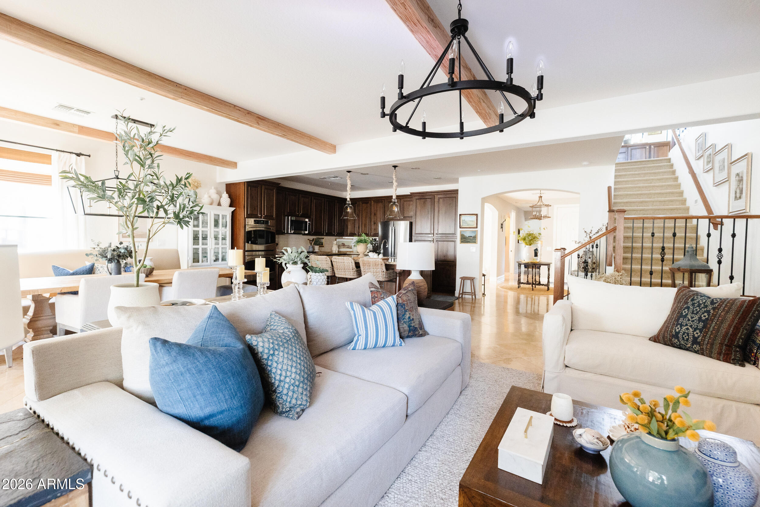 1777 West Ocotillo Road, Unit 29 Chandler, AZ 85248 - Photo 23 of 78 a living room with furniture kitchen view and a chandelier