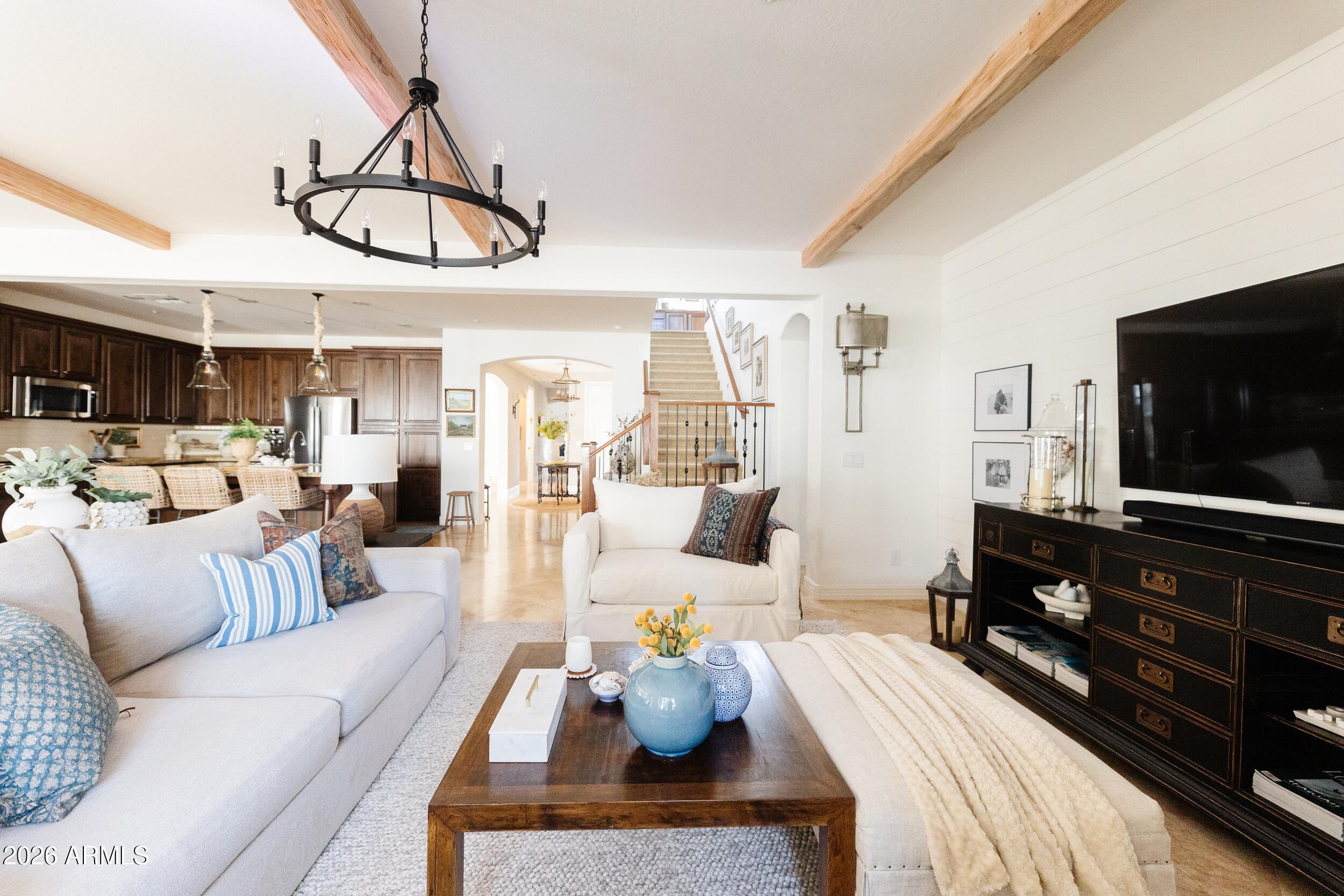 1777 West Ocotillo Road, Unit 29 Chandler, AZ 85248 - Photo 27 of 78 a living room with furniture and a flat screen tv