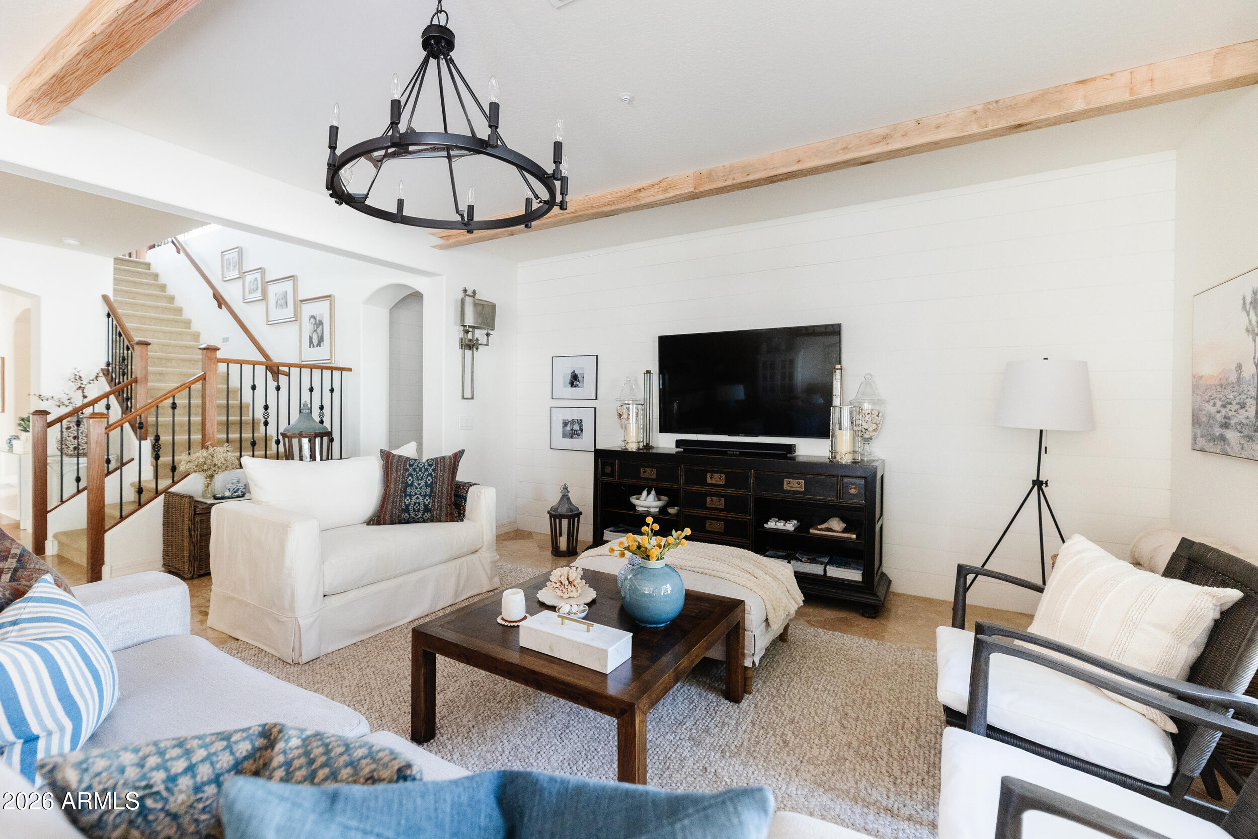 1777 West Ocotillo Road, Unit 29 Chandler, AZ 85248 - Photo 28 of 78 a living room with furniture a flat screen tv and a window
