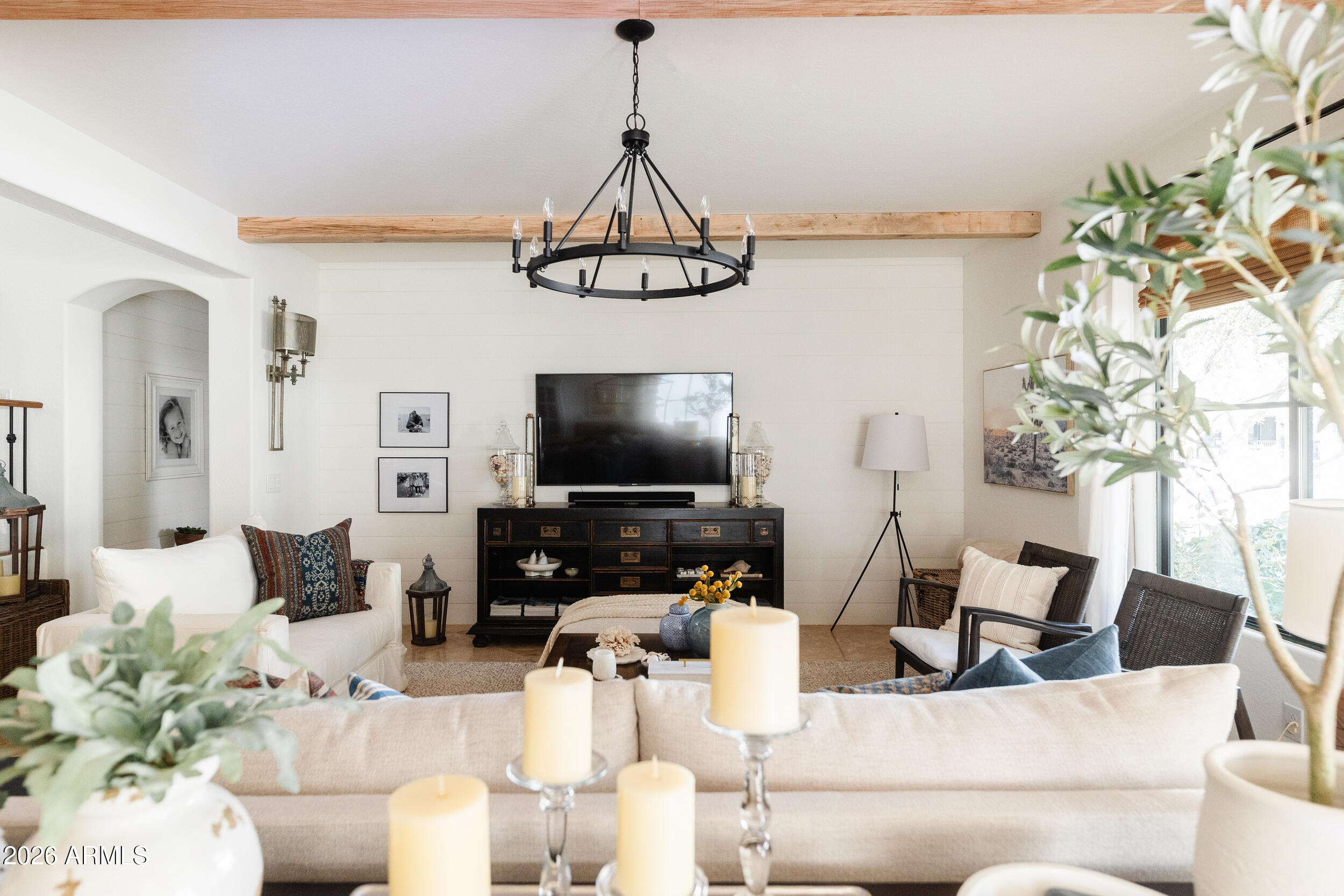 1777 West Ocotillo Road, Unit 29 Chandler, AZ 85248 - Photo 29 of 78 a living room with furniture and a flat screen tv