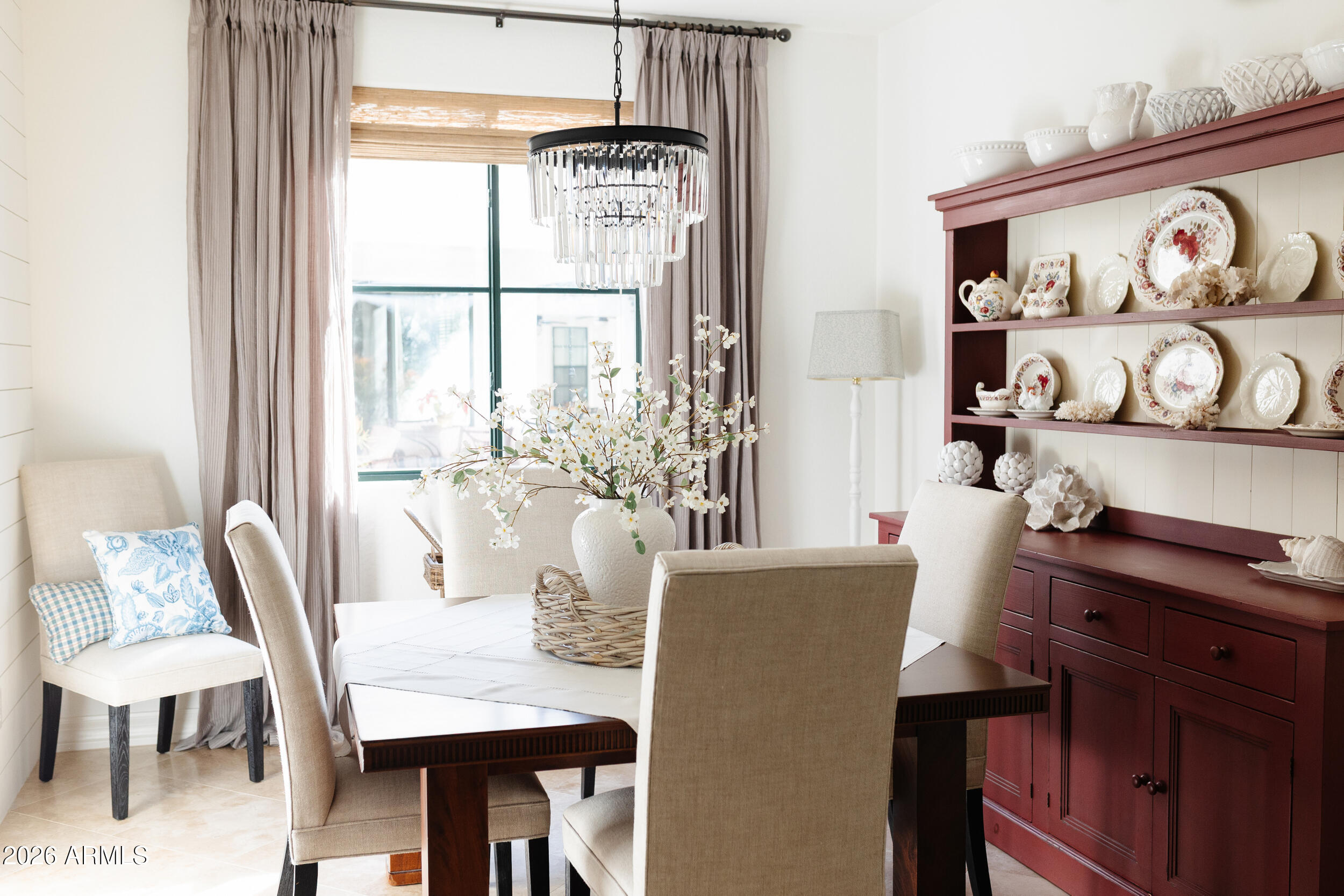 1777 West Ocotillo Road, Unit 29 Chandler, AZ 85248 - Photo 34 of 78 a view of a dining room with furniture window and outside view