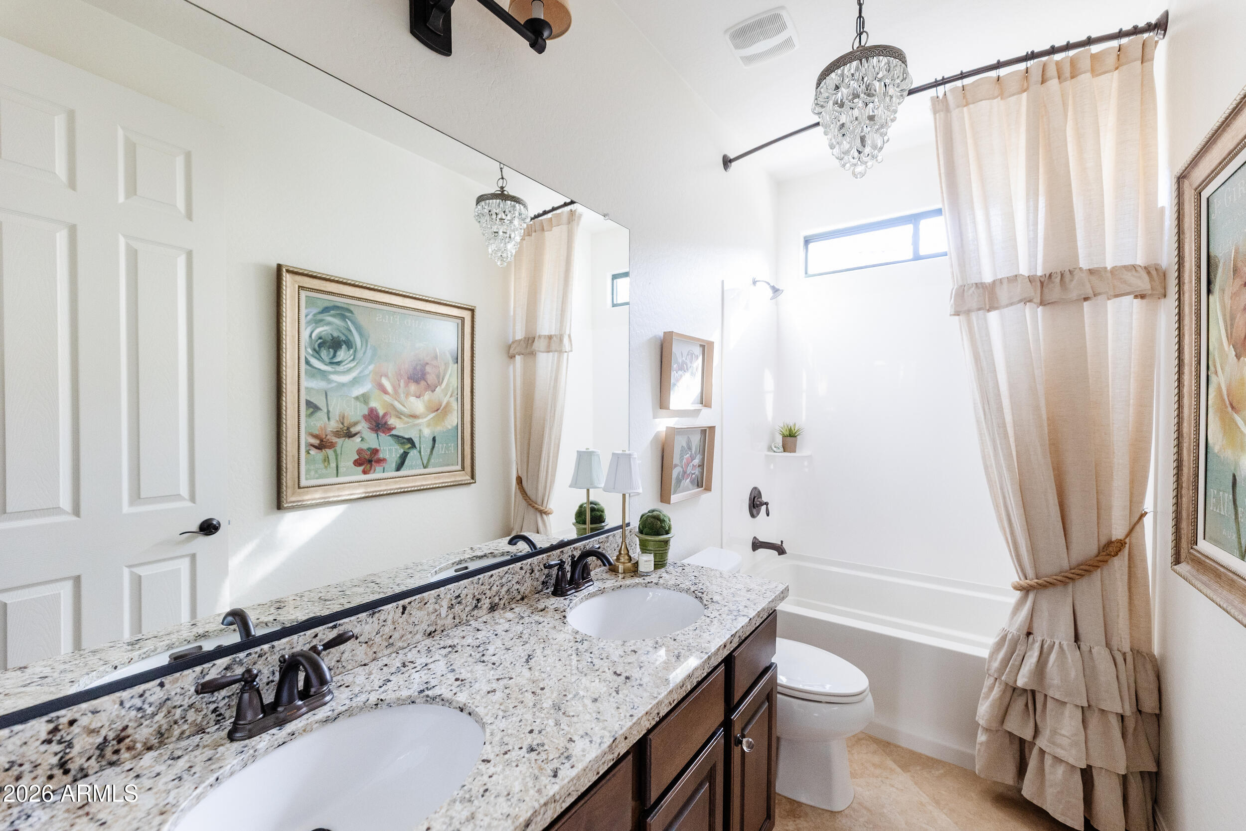 1777 West Ocotillo Road, Unit 29 Chandler, AZ 85248 - Photo 45 of 78 a bathroom with a granite countertop sink a mirror a bathtub and shower