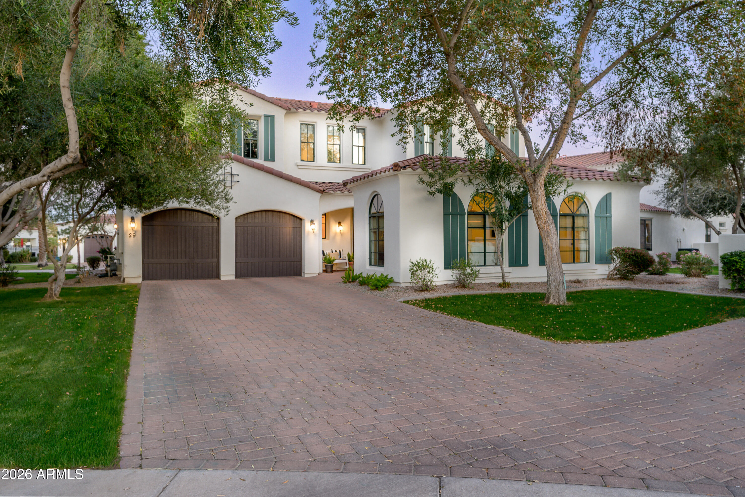 1777 West Ocotillo Road, Unit 29 Chandler, AZ 85248 - Photo 64 of 78 a front view of a house with a garden and trees