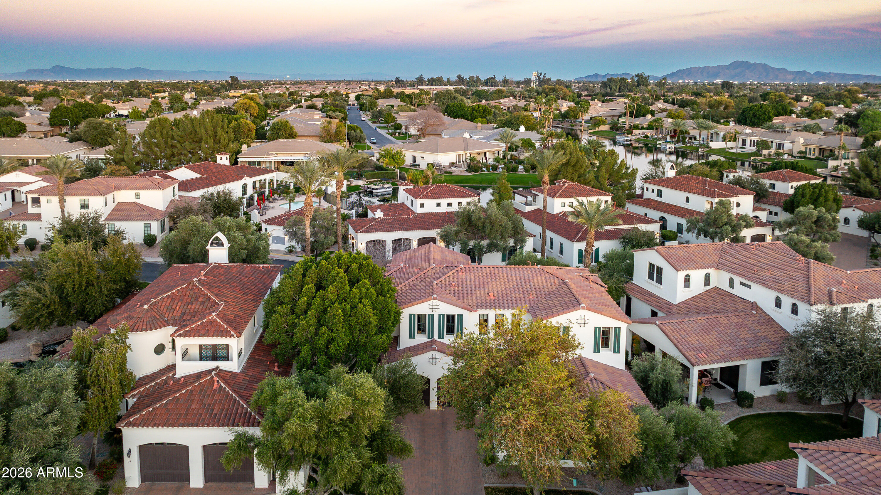 1777 West Ocotillo Road, Unit 29 Chandler, AZ 85248 - Photo 70 of 78 an aerial view of residential houses with outdoor space