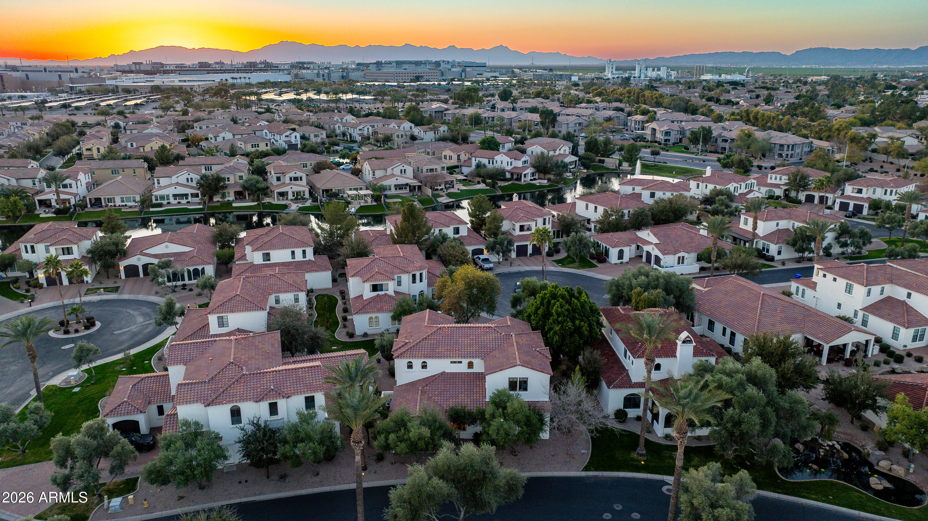 1777 West Ocotillo Road, Unit 29 Chandler, AZ 85248 - Photo 73 of 78 an aerial view of residential houses and outdoor space