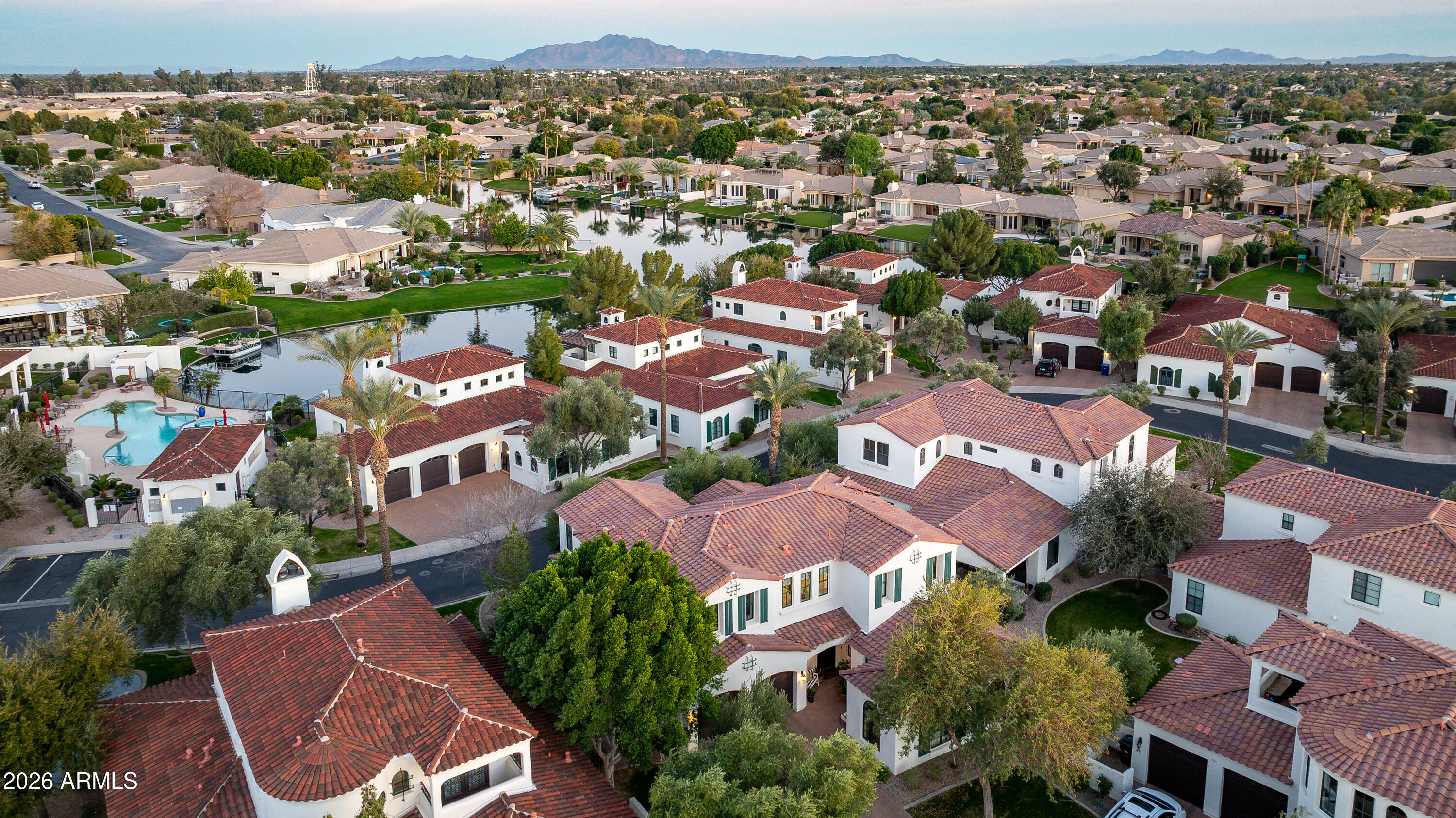1777 West Ocotillo Road, Unit 29 Chandler, AZ 85248 - Photo 74 of 78 an aerial view of residential houses with outdoor space