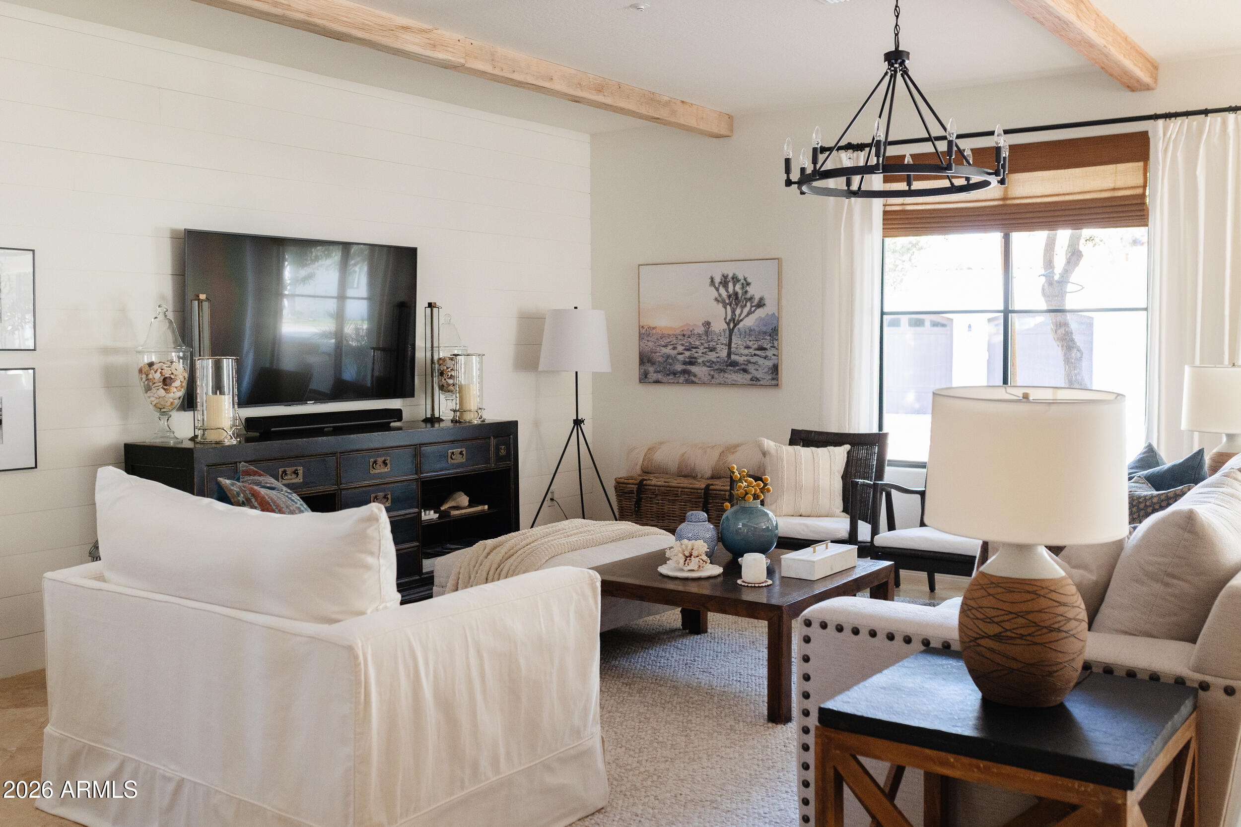 1777 West Ocotillo Road, Unit 29 Chandler, AZ 85248 - Photo 8 of 78 a living room with furniture a window and a flat screen tv