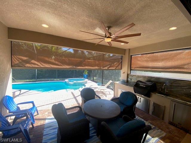 13628 Mandarin Circle Naples, FL 34109 - Photo 14 of 48 a outdoor living space with furniture