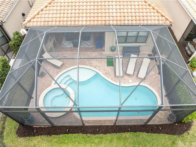 a kitchen with a stove and a refrigerator