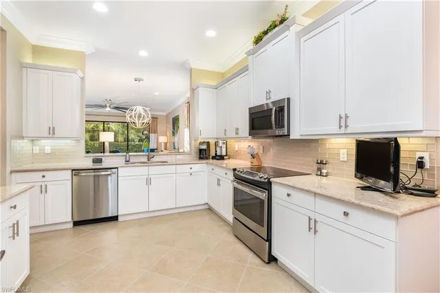 a kitchen with table and chairs